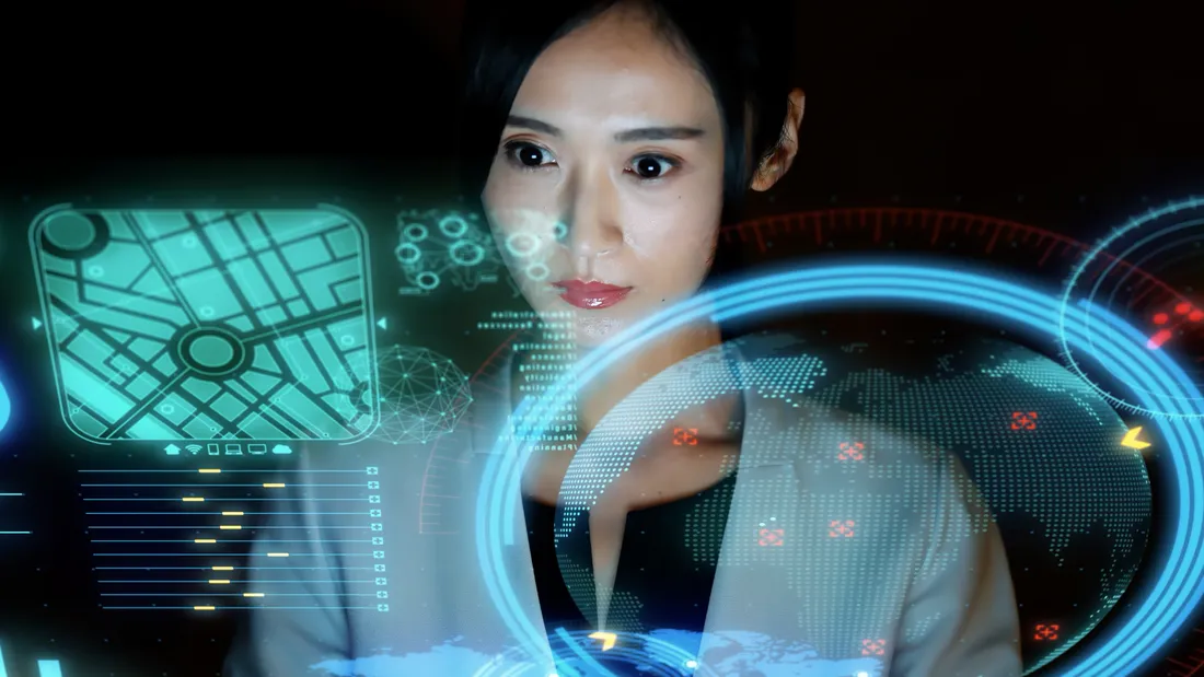 A professional working with holographic AI screens